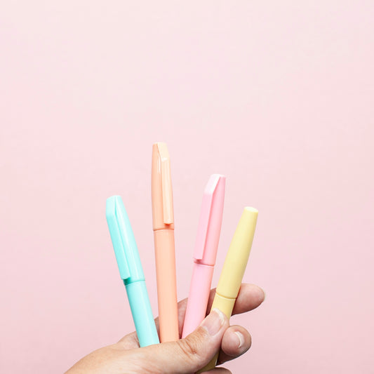 four assorted-color pens