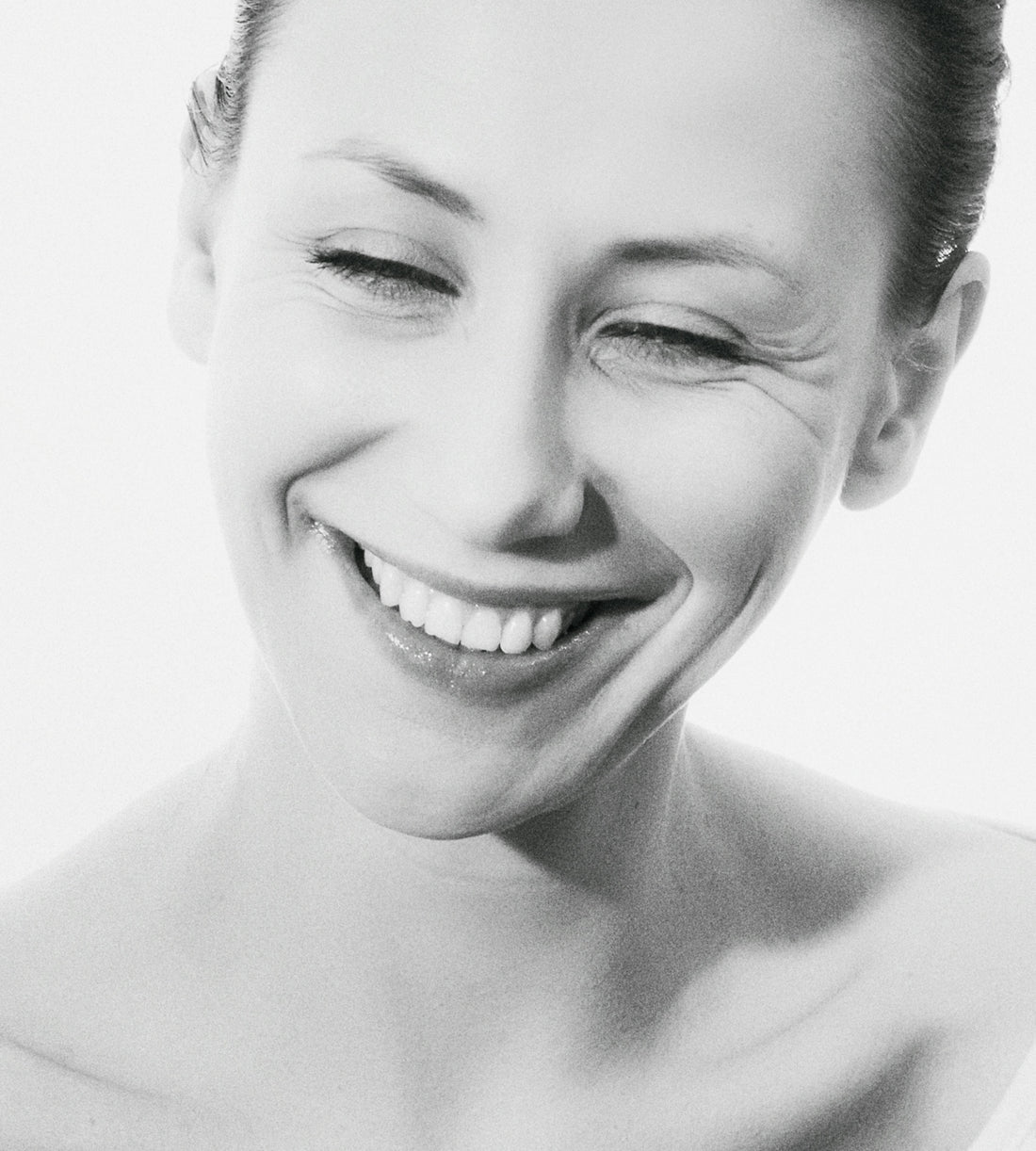 a woman smiling for the camera
