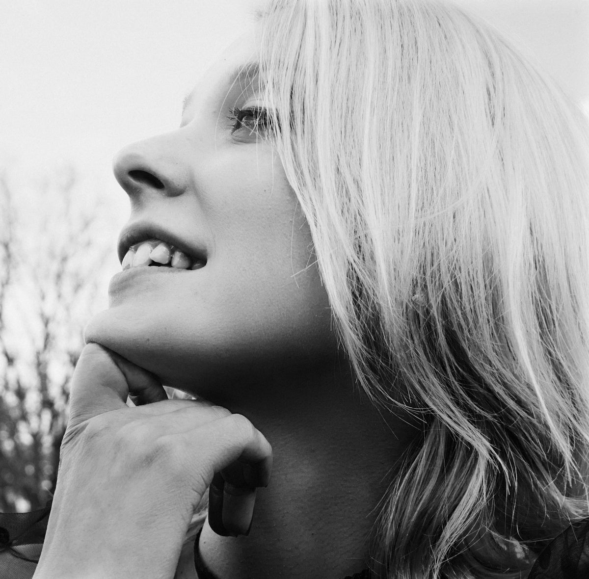 a black and white photo of a woman