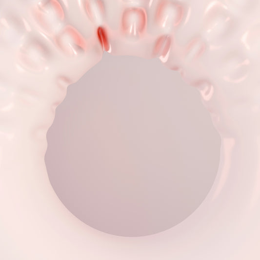 A close up of a pink eyeball with a white background